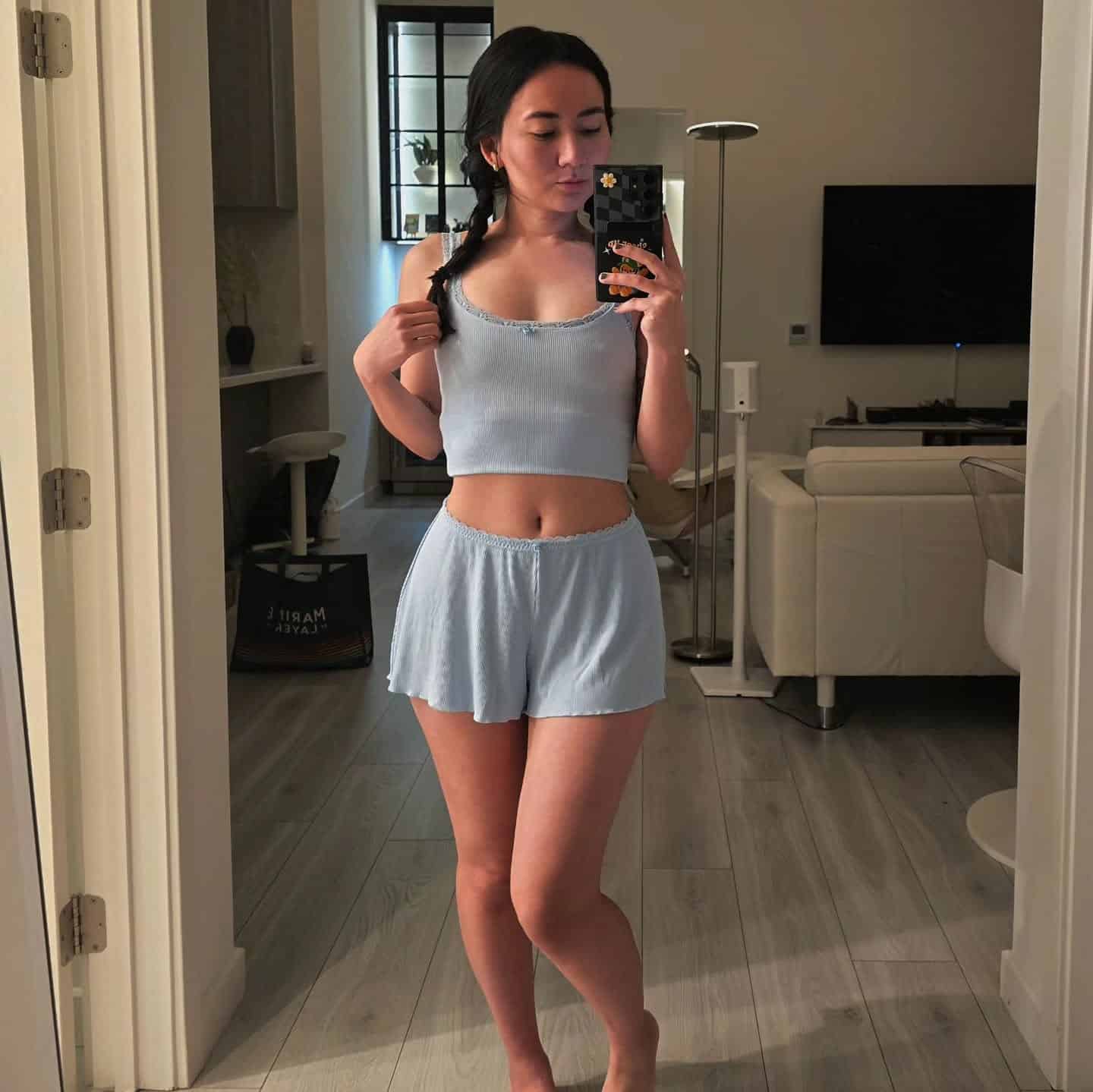 Alana Cho in a photo highlighting her height